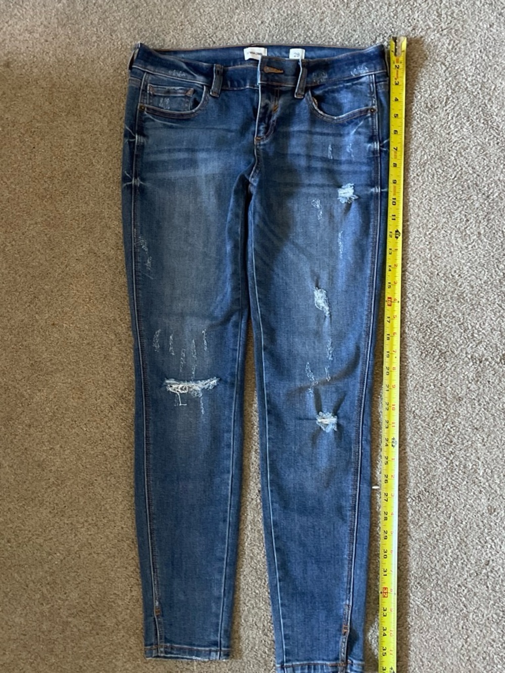 Sneak Peek Dark Blue Distressed Skinny Jeans